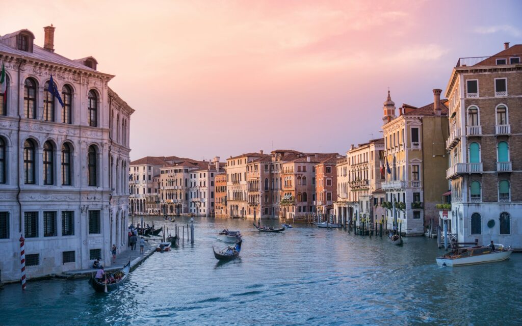 Gondolas on the Grand Canal in Venice at sunset
