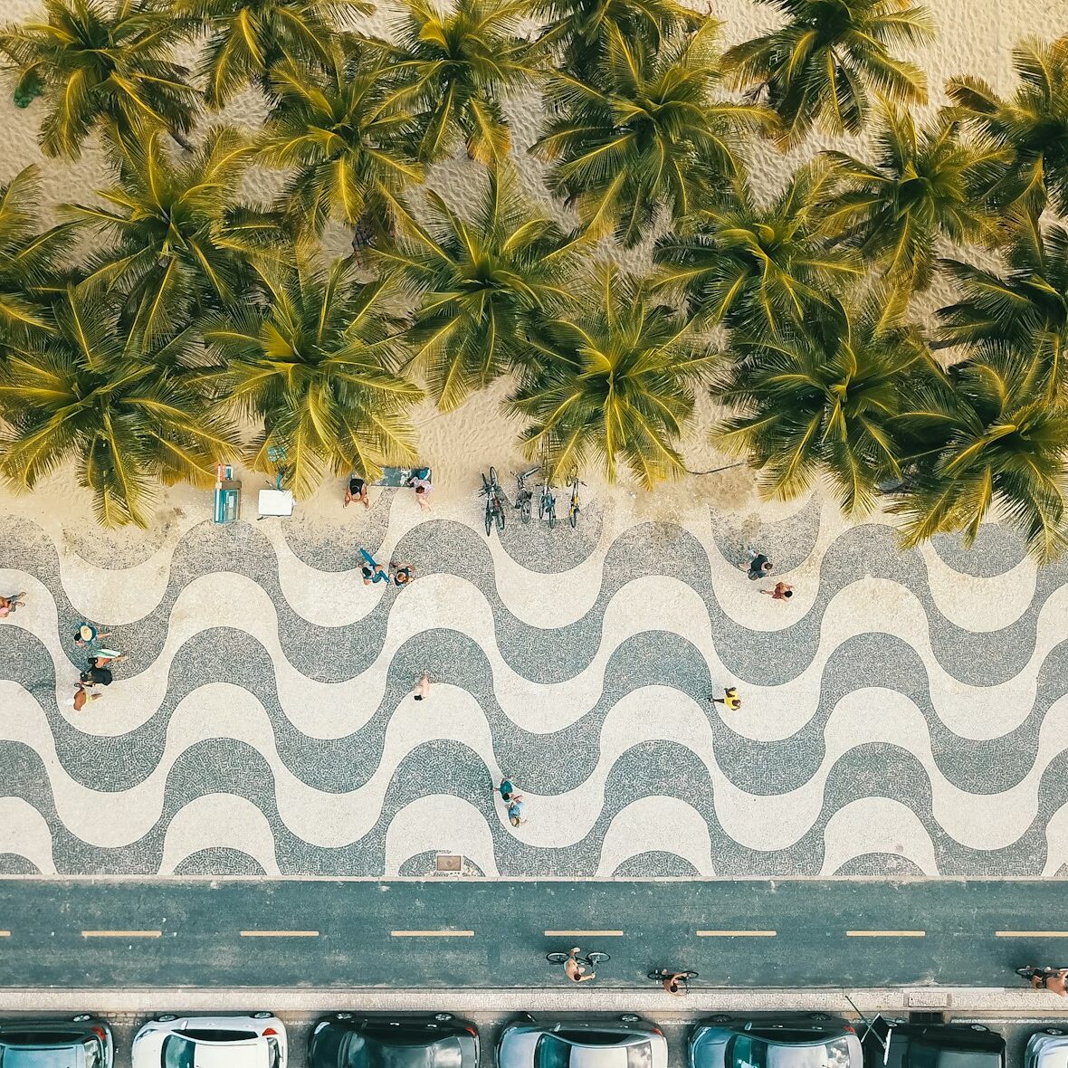 Aerial view of the wave-pattern Copacabana promenade and palm trees in Rio de Janeiro